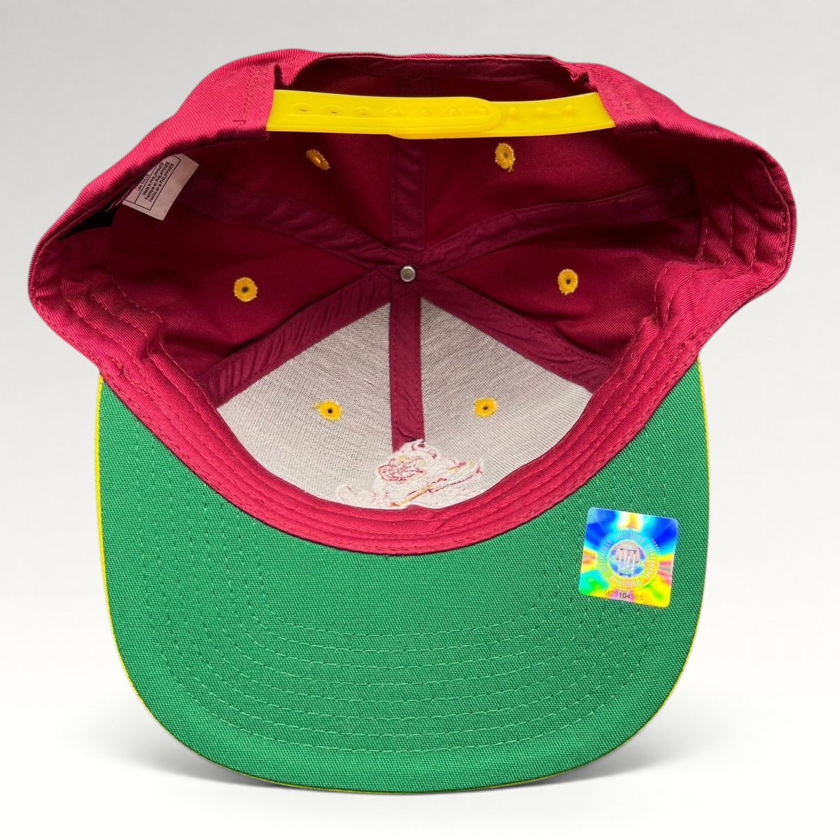 Raree Finds vintage Arizona State Sun Devils snapback interior showing green undervisor, yellow snap, and NCAA tag