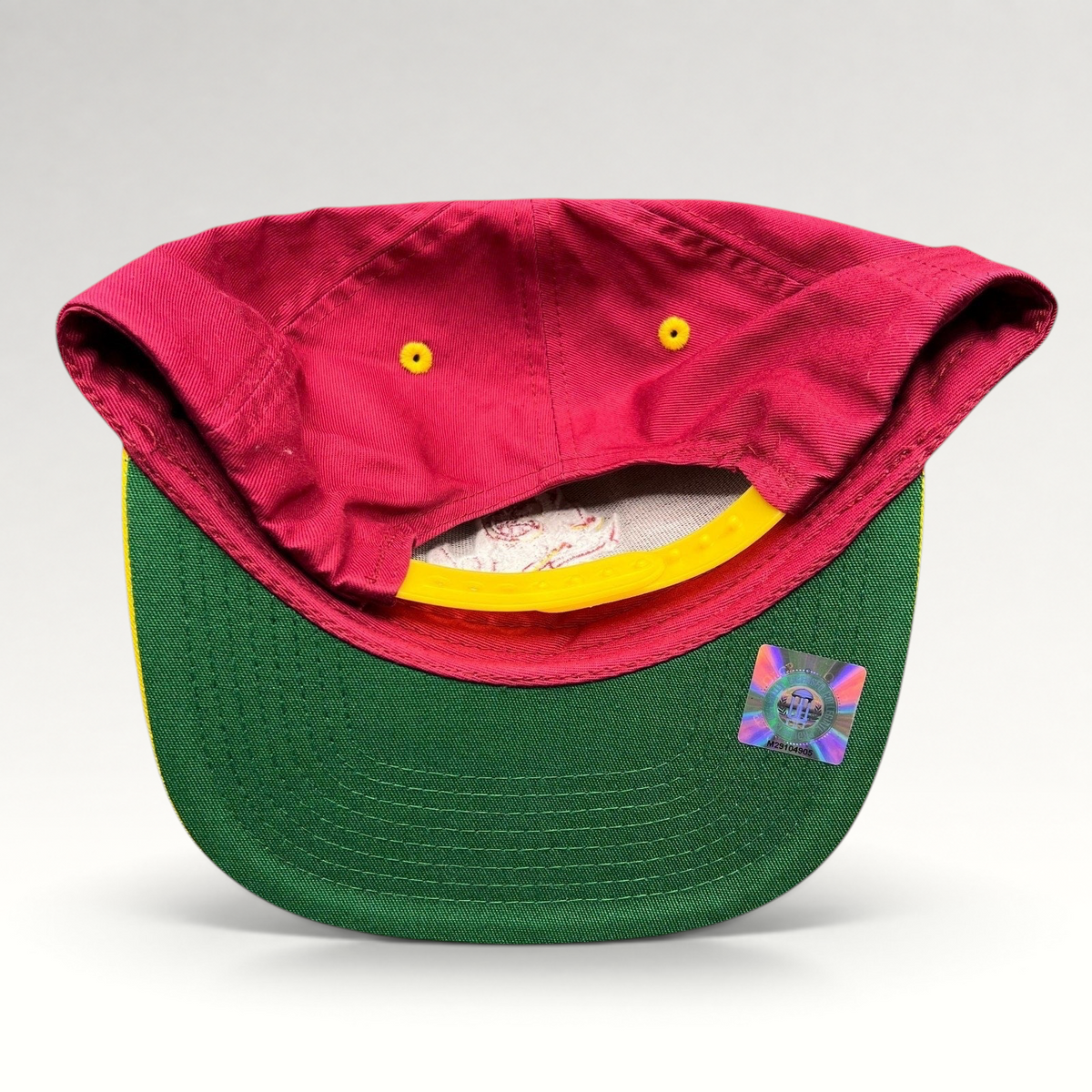 Raree Finds vintage Arizona State Sun Devils snapback showing the green undervisor, yellow snap, and NCAA hologram.