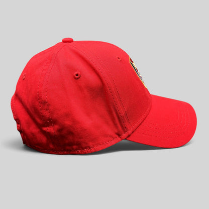 Raree Finds red Arsenal FC strapback hat with curved brim and embroidered cannon crest logo, side profile view.