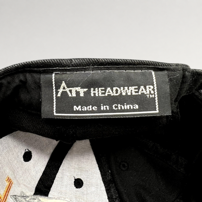 Raree Finds black cotton cap interior showing the Art Headwear brand label and Made in China tag