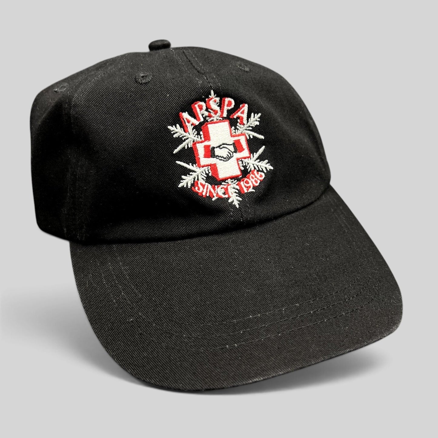 Raree Finds vintage black cotton Ouray Sportswear ASPA Ski Patrol hat with embroidered cross logo and Since 1946 text