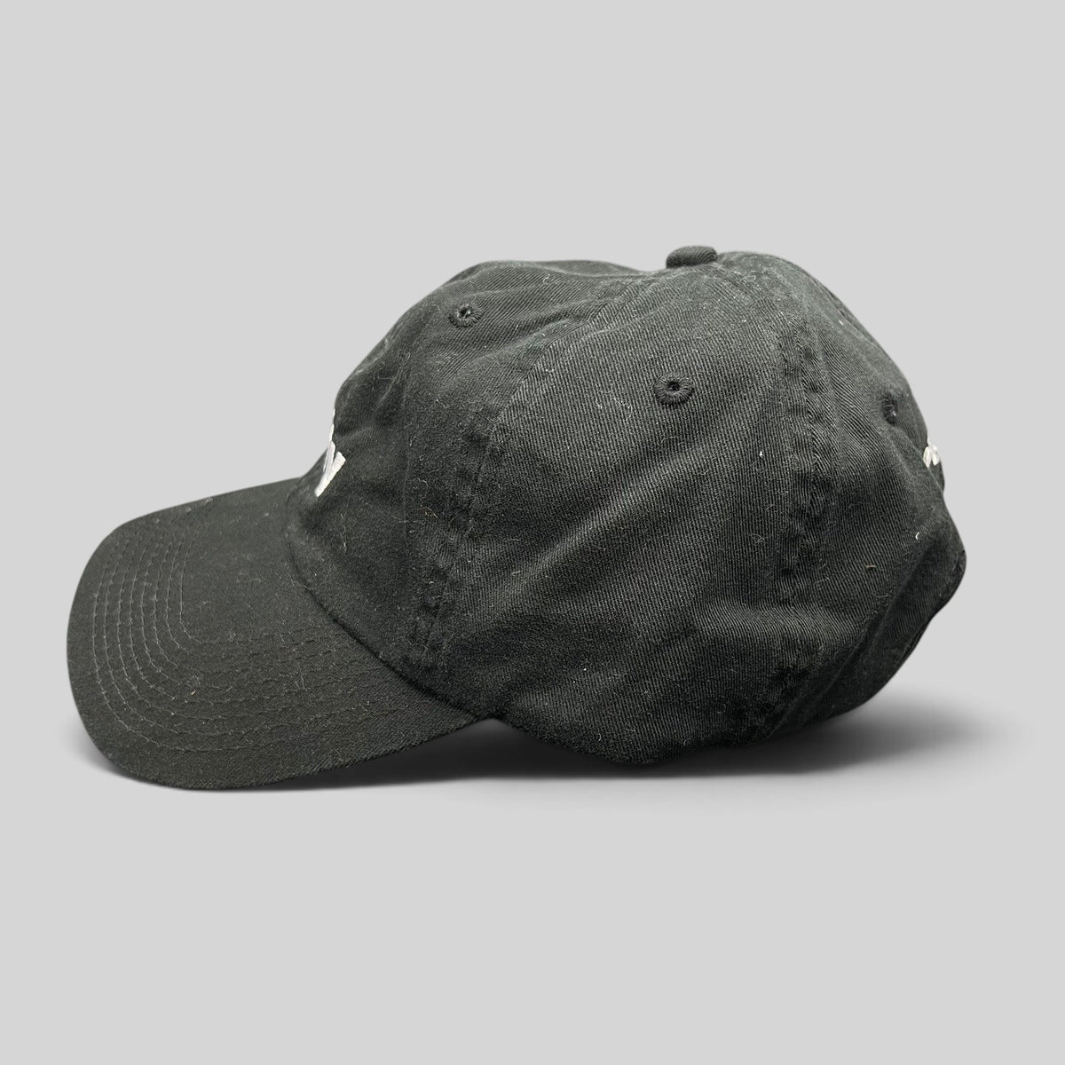 Raree Finds black cotton Aspen 2017 anniversary strapback hat with white #fifty embroidery in a low-profile fit.