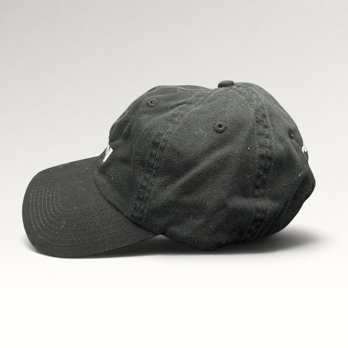 Raree Finds black cotton Aspen 2017 anniversary strapback hat with white #fifty embroidery in a low-profile fit.