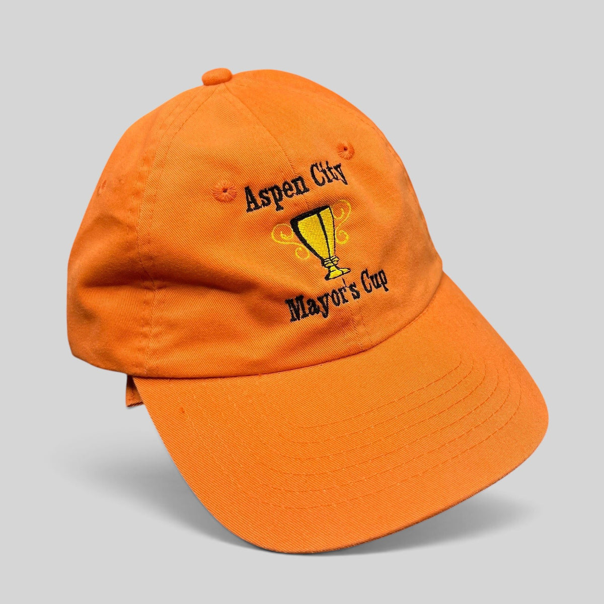 Raree Finds orange cotton dad cap featuring embroidered Aspen City Mayor’s Cup trophy graphic and curved brim.