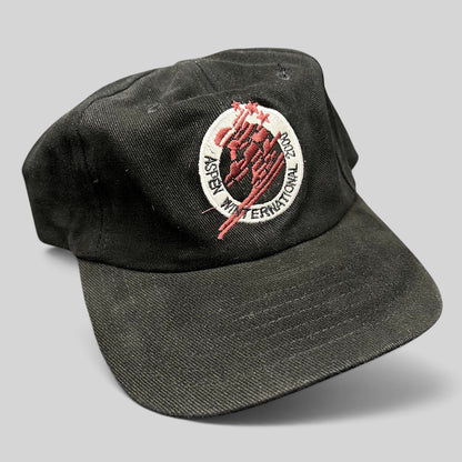 Raree Finds vintage black cotton strapback hat featuring Aspen Winternational 2000 embroidered skier logo