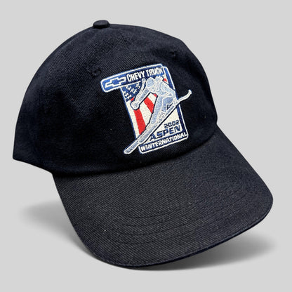 Raree Finds navy blue 2002 Aspen Winternational cotton strapback hat with Chevrolet Truck and skier embroidery.