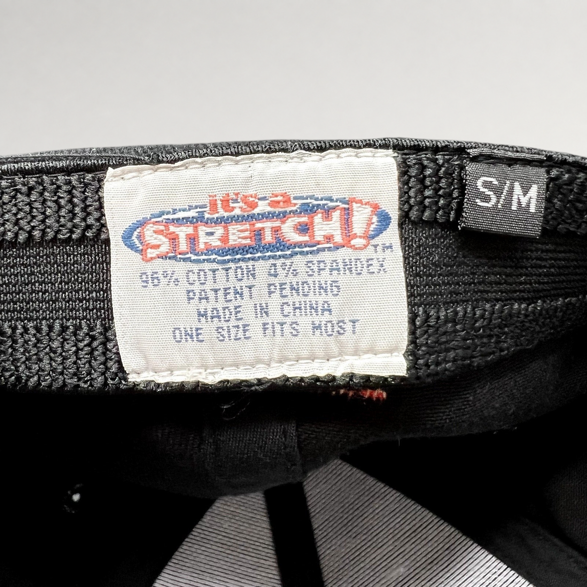 Raree Finds vintage 2004 Aspen Wintersköl hat interior label showing Stretch! cotton spandex branding and size S/M