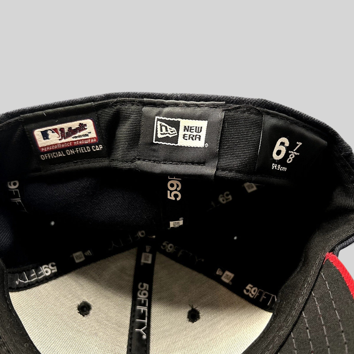 Raree Finds New Era 59FIFTY Atlanta Braves fitted hat interior showing size 6 7/8 label and MLB authentic branding