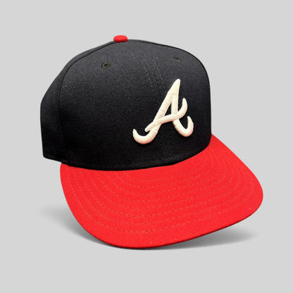 Raree Finds Atlanta Braves 59FIFTY fitted hat with navy crown, red flat brim, and white embroidered A logo