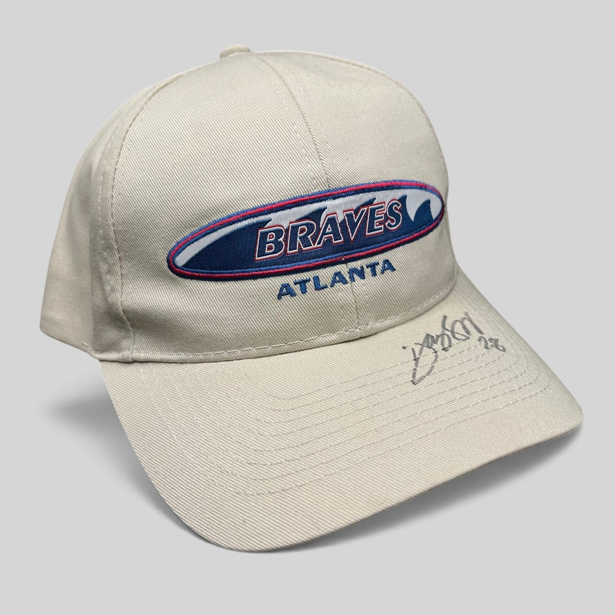 Raree Finds vintage khaki Atlanta Braves Logo Athletic strapback hat with signed brim and embroidered team logo