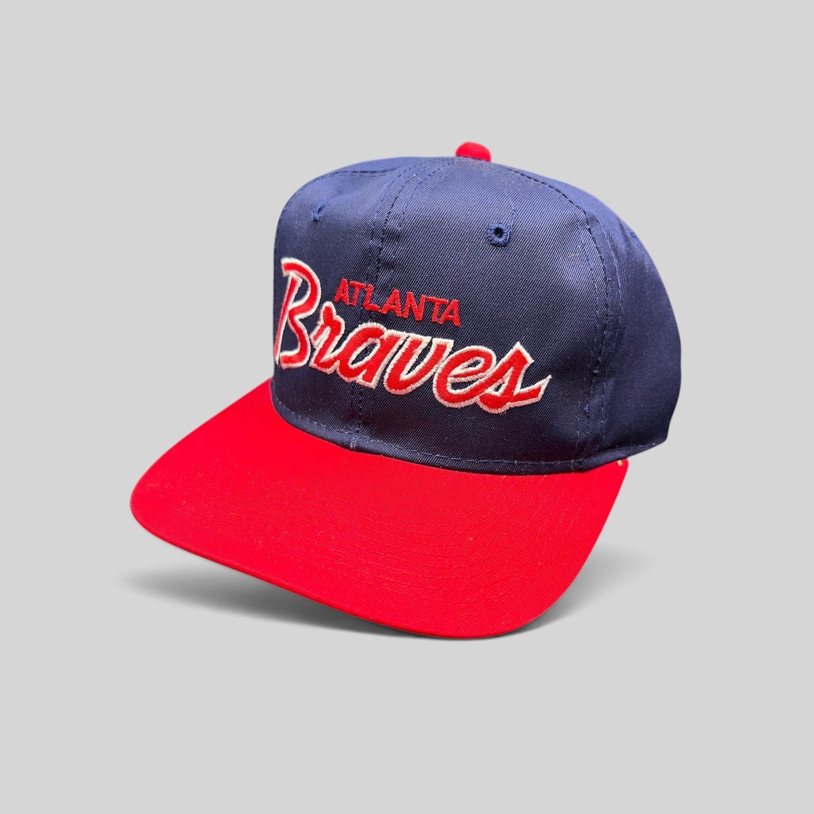 Raree Finds vintage 90s Atlanta Braves Sports Specialties snapback hat with navy crown and red brim