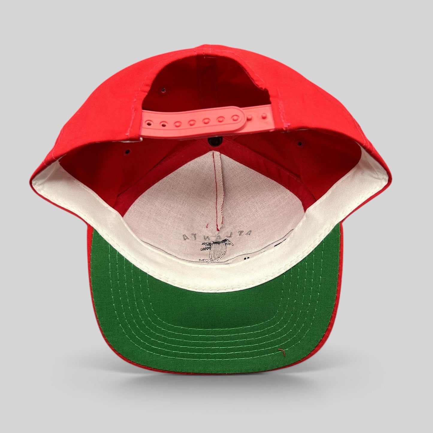 Raree Finds vintage Atlanta Falcons Sports Specialties snapback hat showing the green undervisor and adjustable strap