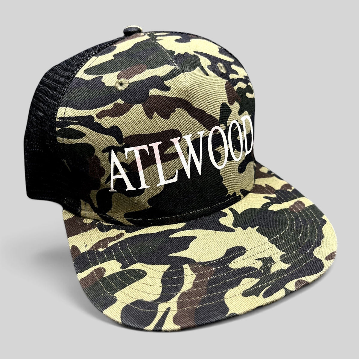 Raree Finds ATLWOOD woodland camo mesh trucker hat with white embroidered logo and flat brim