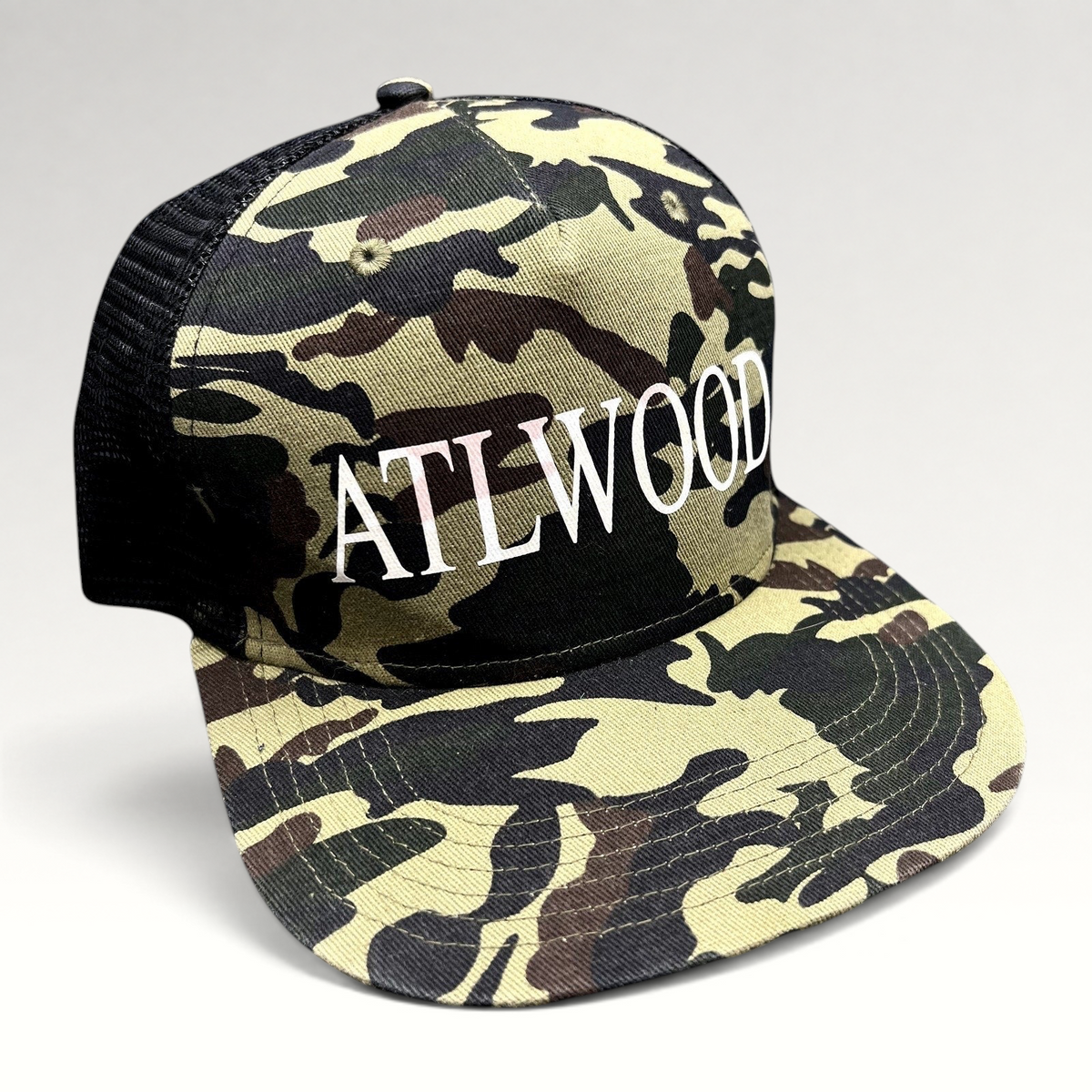 Raree Finds ATLWOOD woodland camo mesh trucker hat with white embroidered logo and flat brim