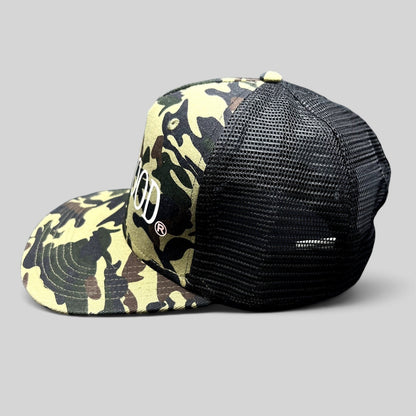 Raree Finds ATLWOOD woodland camo trucker hat with black mesh back, flat brim, and white front embroidery.