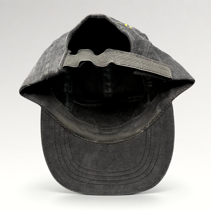 Raree Finds vintage black cotton Atomic ARC ski cap showing the interior elastic strapback and brim construction