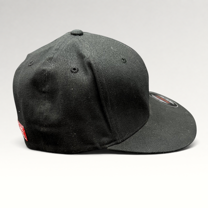 Raree Finds black Atomic Skis FlexFit cap with a flat brim and embroidered branding, side profile view.