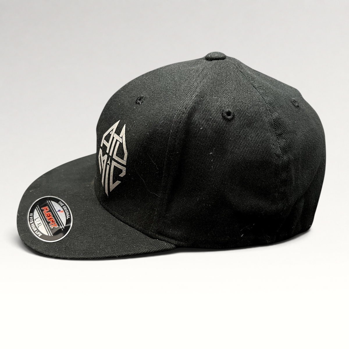 Raree Finds black Atomic Skis FlexFit cap with embroidered logo and flat brim, size L/XL.