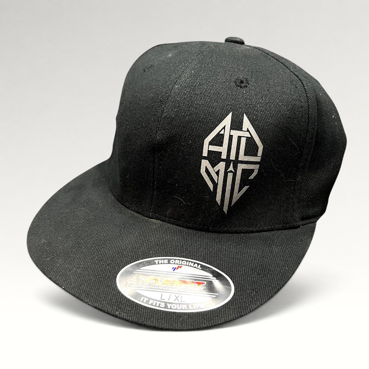 Raree Finds black Atomic Skis FlexFit cap with embroidered logo and red graphic undervisor