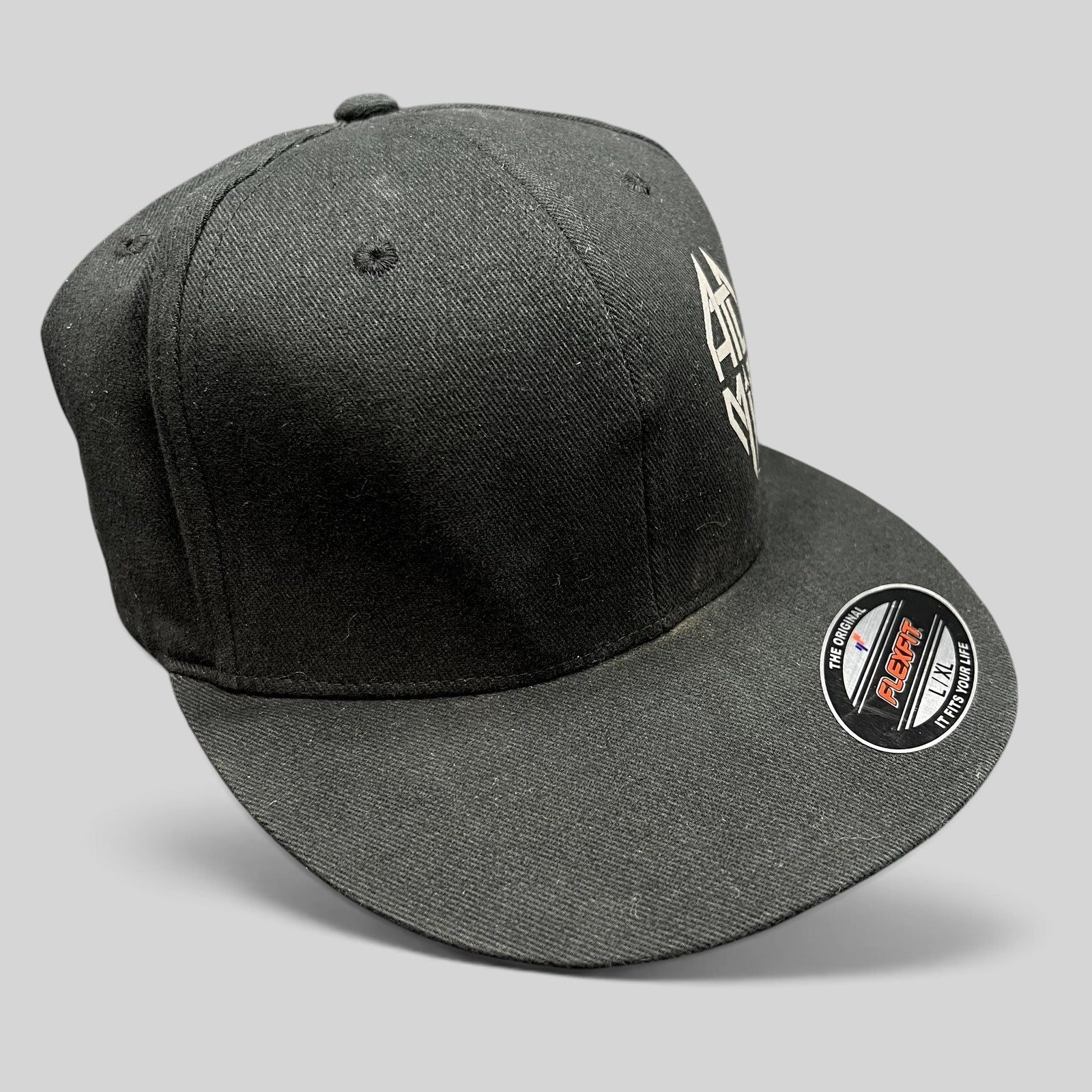 Raree Finds black Atomic Skis FlexFit cap with embroidered logo and flat brim, size L/XL.