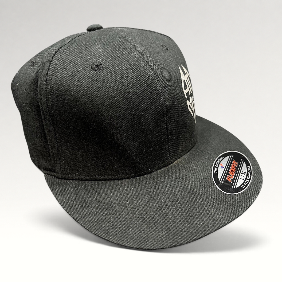 Raree Finds black Atomic Skis FlexFit baseball cap with embroidered logo and flat brim, size L/XL.
