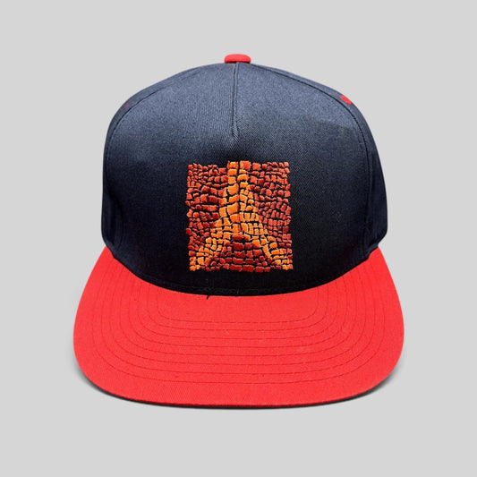 Raree Finds Atomic Skis navy and red snapback hat with embroidered Eiffel Tower mosaic graphic on the front