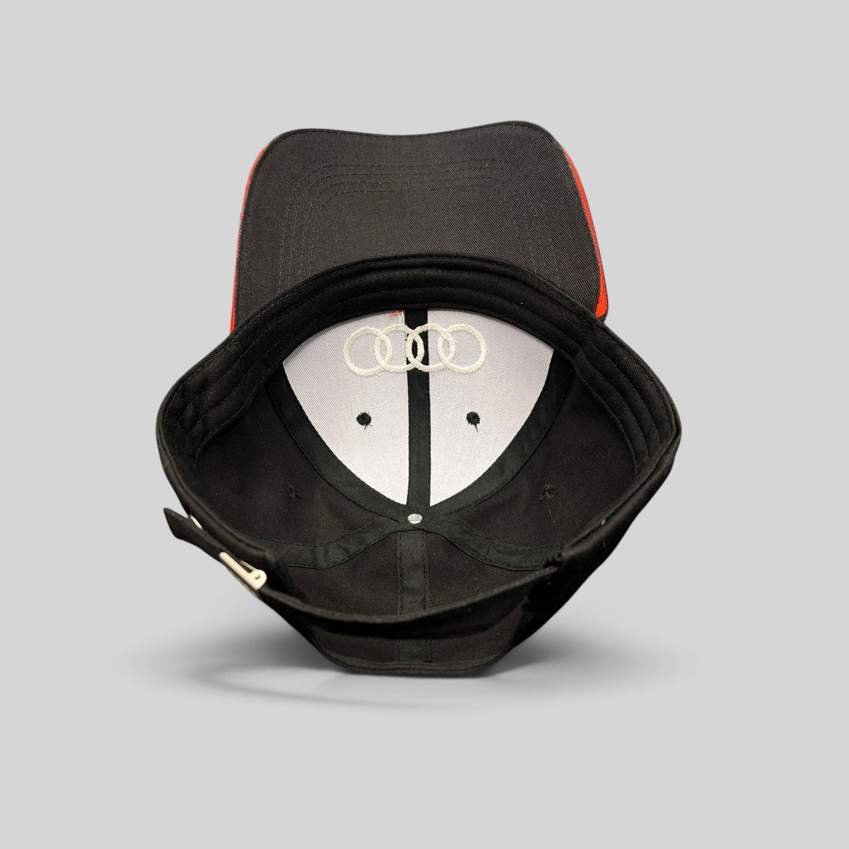 Raree Finds black cotton twill Audi hat interior view showing embroidered logo and red underbrim accent