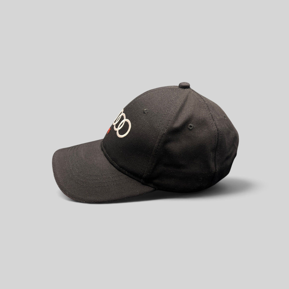 Raree Finds black cotton twill Audi hat with embroidered logo and red underbill detail