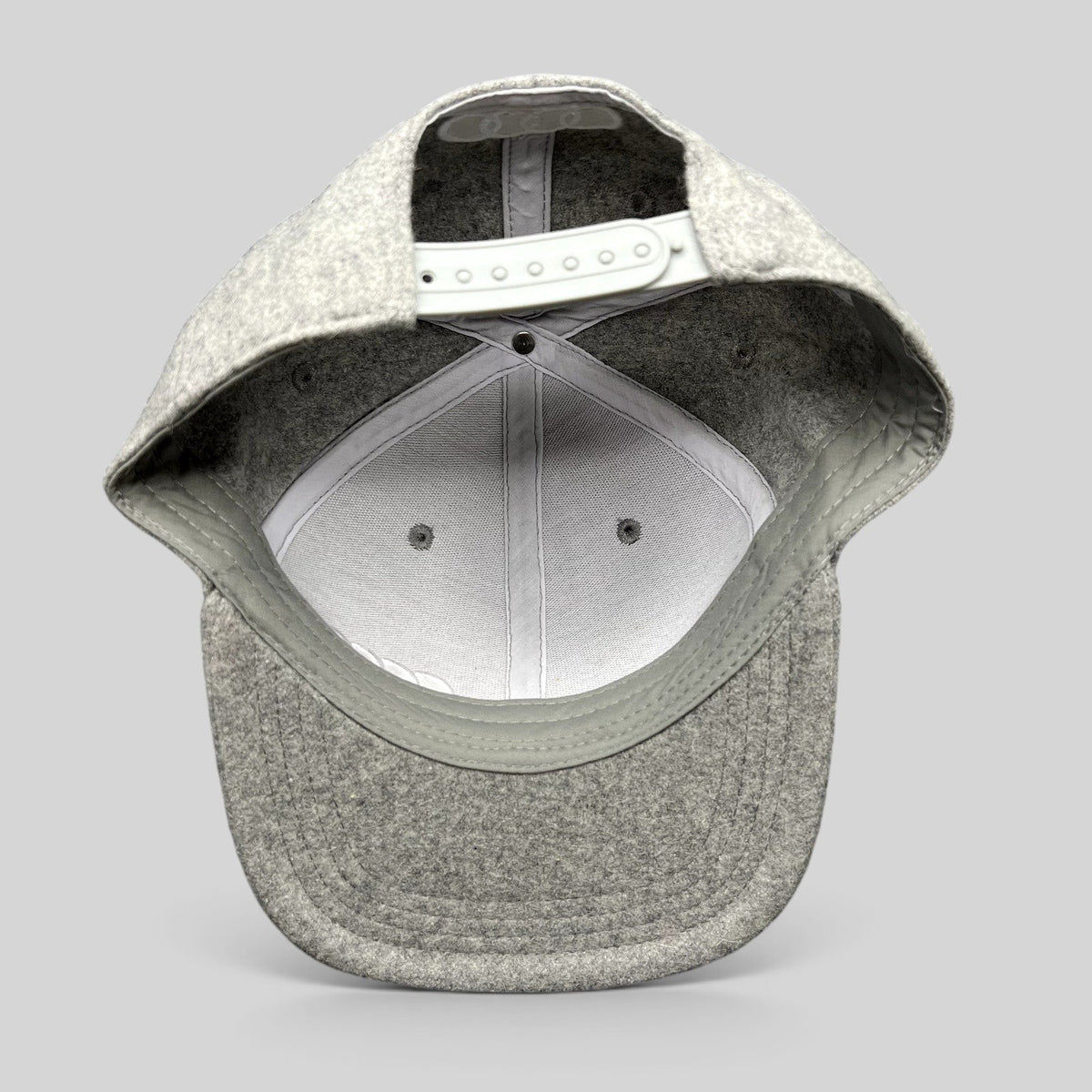 Raree Finds Audi FIS Alpine World Cup snapback hat interior view showing gray felted wool blend and snapback closure