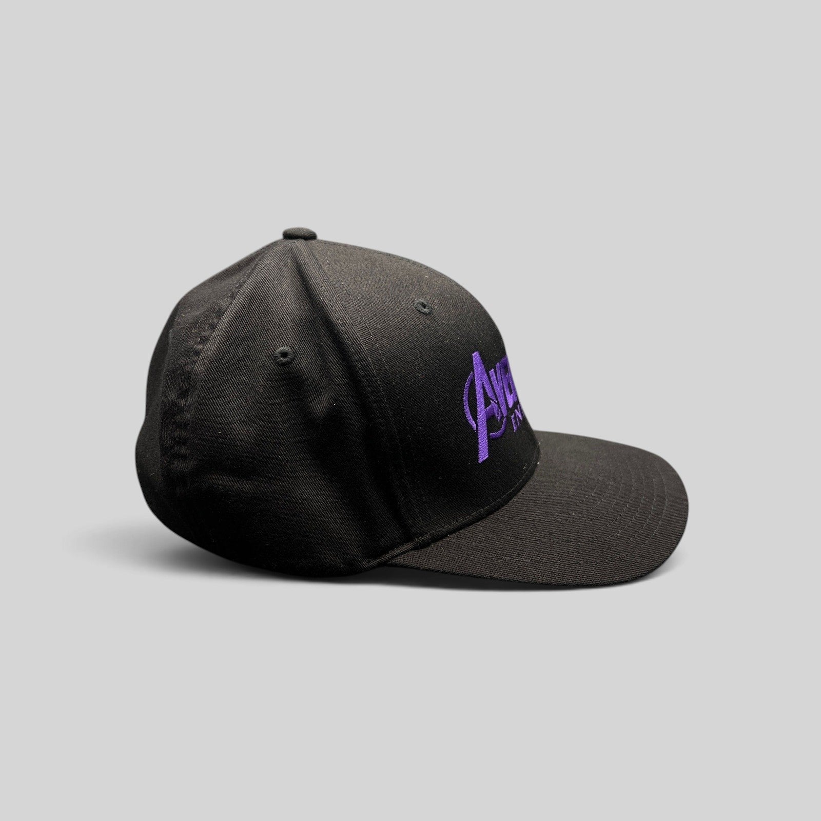 Raree Finds Avengers Endgame cast and crew Flexfit hat in black with purple embroidered logo and light gray brim