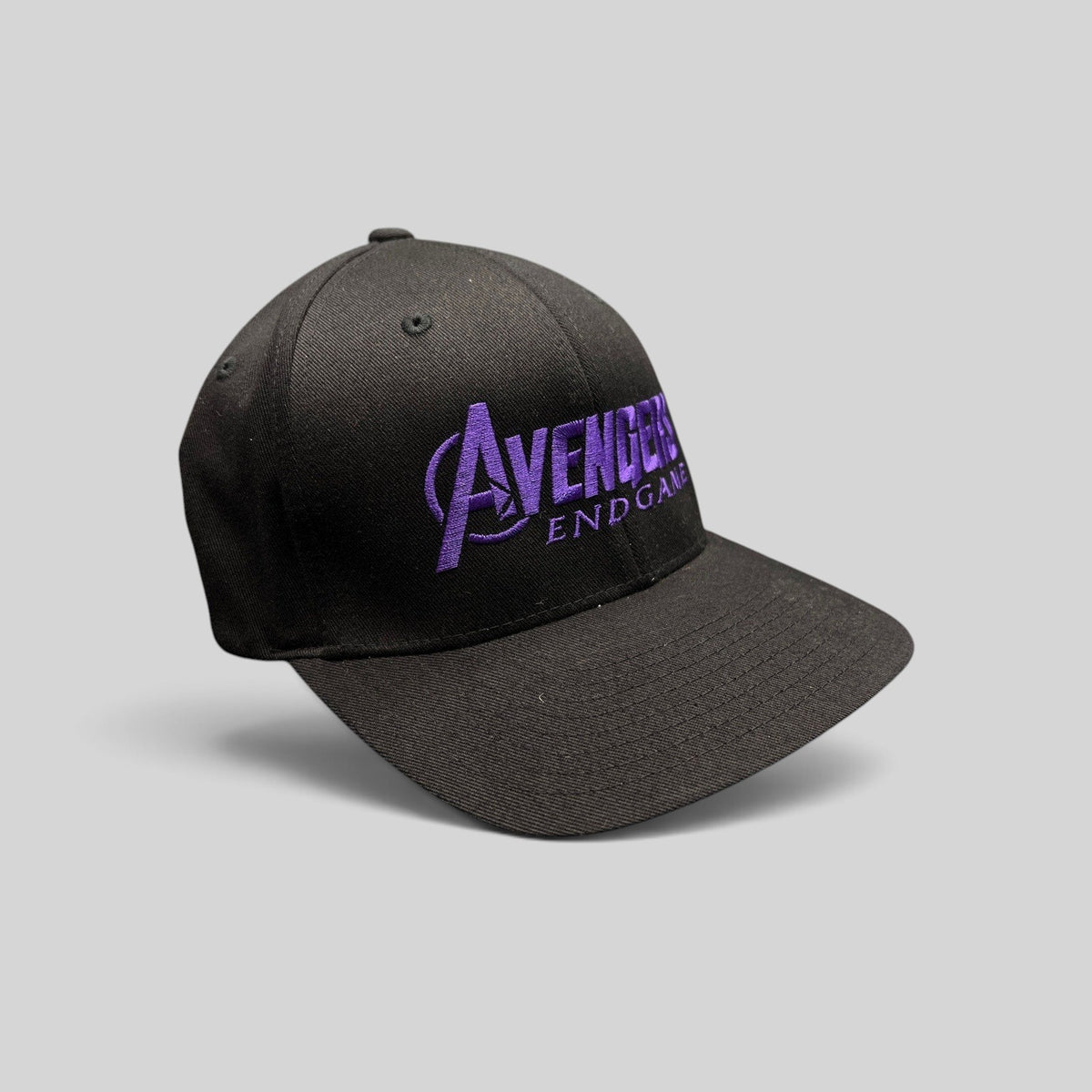 Raree Finds Avengers Endgame cast and crew Flexfit hat with purple embroidered logo on a black crown