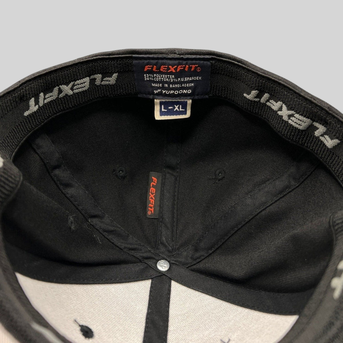 Raree Finds Avengers Endgame cast and crew Flexfit hat interior showing official Marvel Studios branding and size tag