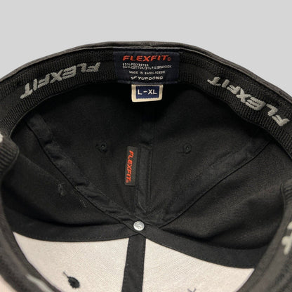 Raree Finds Avengers Endgame cast and crew Flexfit hat interior showing official Marvel Studios branding and size tag