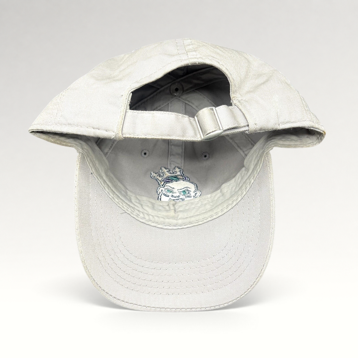 Raree Finds cream cotton strapback dad hat with New Orleans Baby Cakes logo on the interior and signed brim