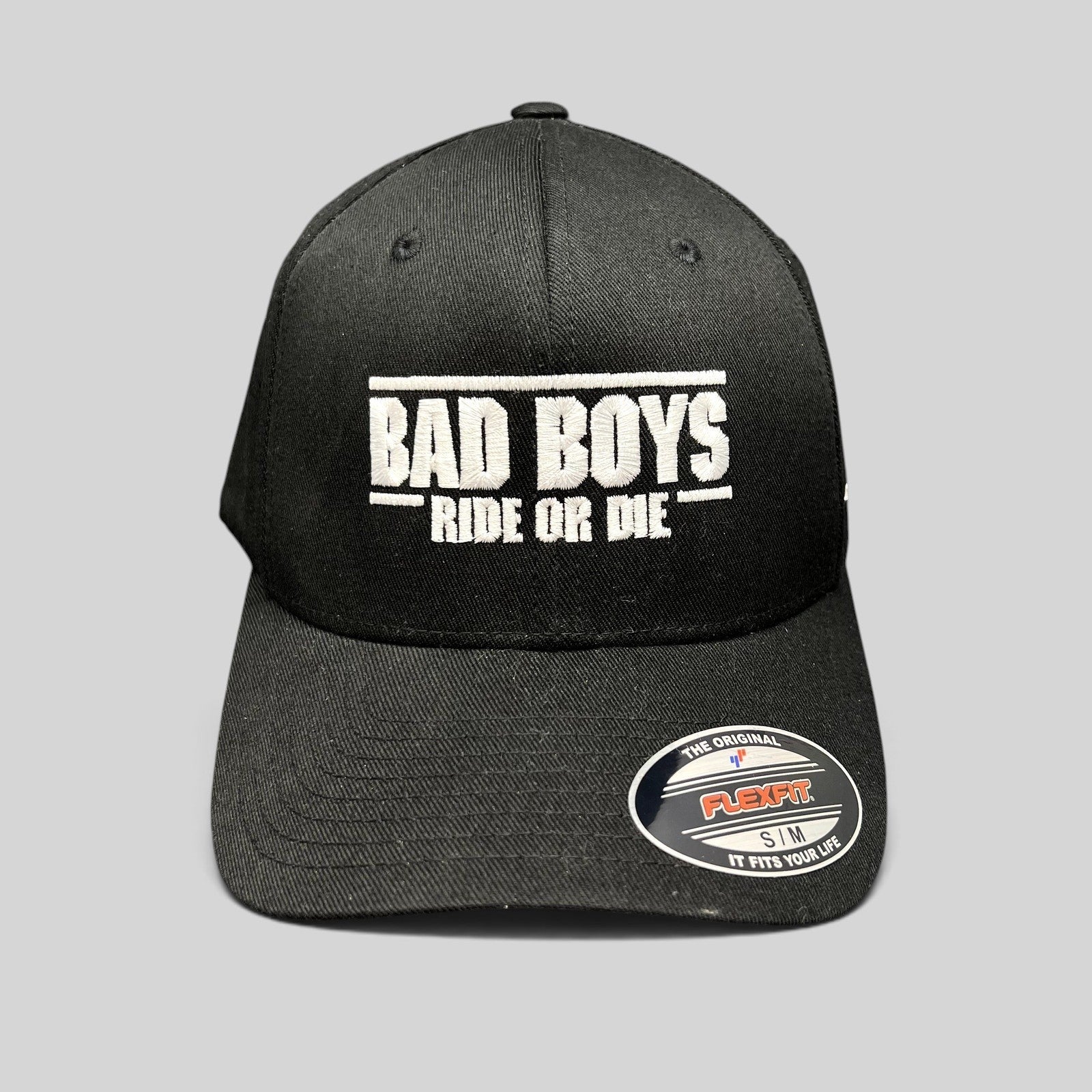 Raree Finds black Flexfit hat featuring white Bad Boys Ride or Die embroidery, authentic cast and crew wrap gift.