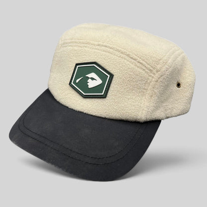 Raree Finds Baldface cream fleece strapback hat with a black bill and green rubber logo patch
