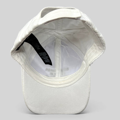 Raree Finds white Balenciaga cotton strapback hat interior view showing brand label and adjustable strap closure