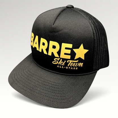 Raree Finds black and gold Barre Vermont trucker snapback hat with mesh back and Ski Town All-Stars branding.