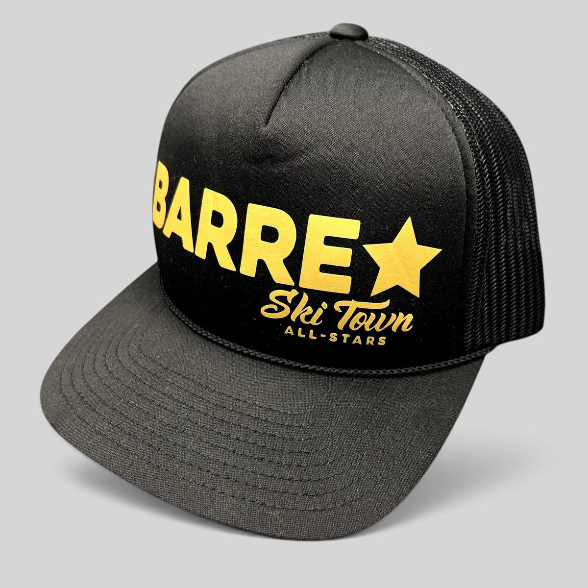 Raree Finds black and gold Barre Vermont trucker snapback hat with mesh back and Ski Town All-Stars branding