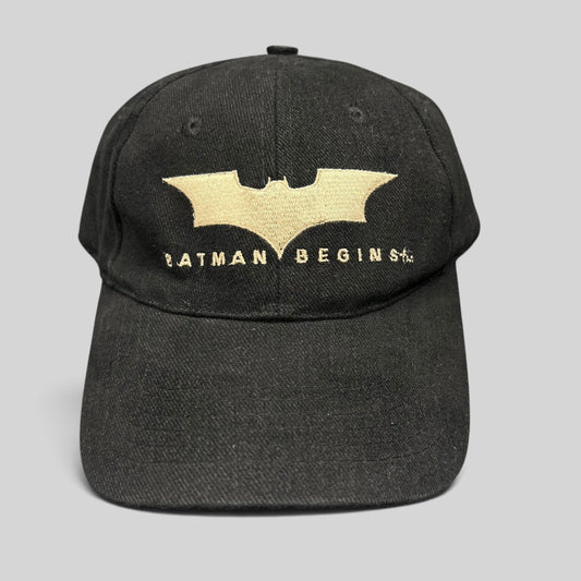 Raree Finds vintage 2005 Batman Begins black cotton strapback hat with gold embroidered bat symbol and movie logo