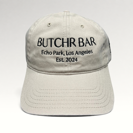 Raree Finds beige cotton twill strapback hat with black Butchr Bar Echo Park Los Angeles embroidery