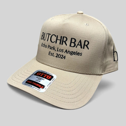 Raree Finds beige OTTO snapback hat with black BUTCHR BAR Echo Park Los Angeles embroidery and curved brim