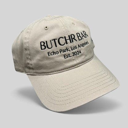 Raree Finds beige cotton twill strapback hat with black Butchr Bar Echo Park Los Angeles embroidery
