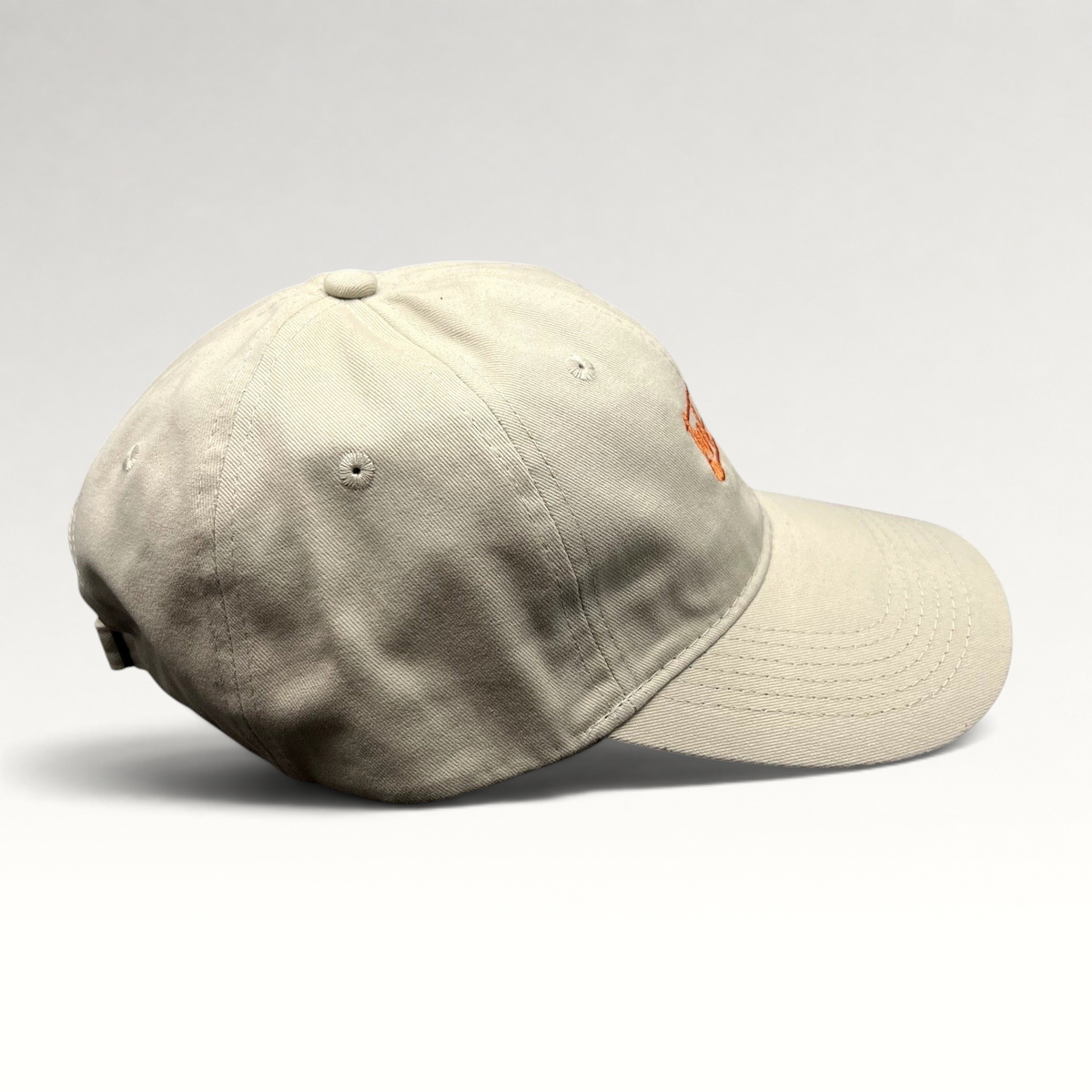 Raree Finds beige cotton strapback dad hat with orange Tuk Tuk Thai embroidery and a curved brim