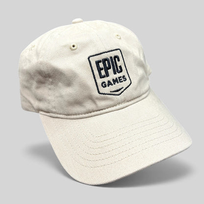 Raree Finds beige cotton twill dad cap with embroidered Epic Games shield logo and curved brim