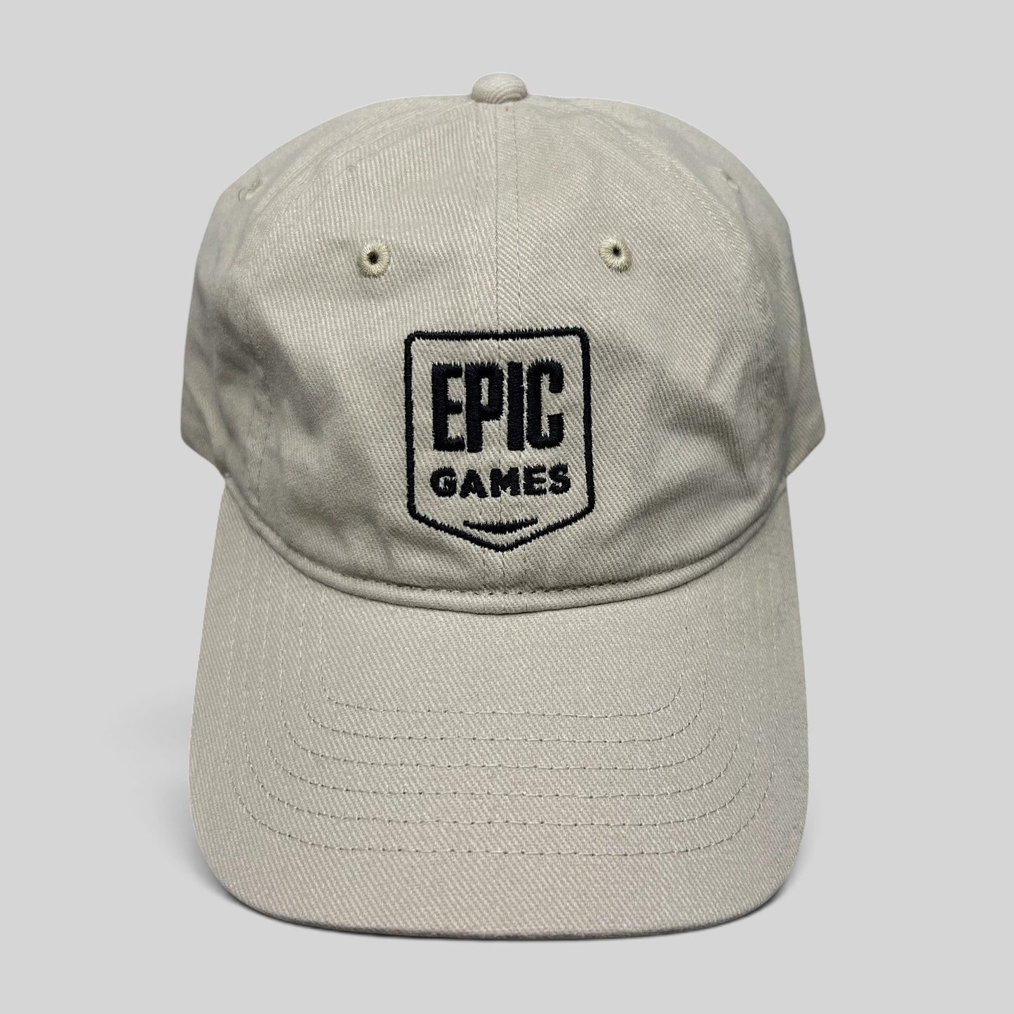 Raree Finds beige cotton twill dad cap with black embroidered Epic Games shield logo on the front