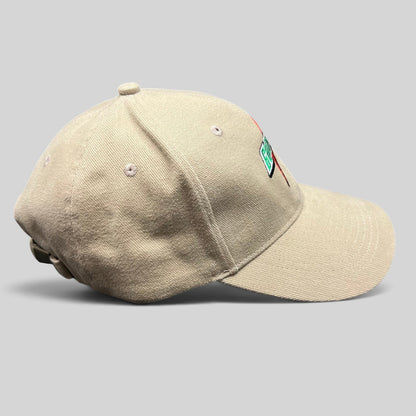 Raree Finds vintage beige Cap America strapback hat with embroidered Gatorade lightning logo, side profile view.