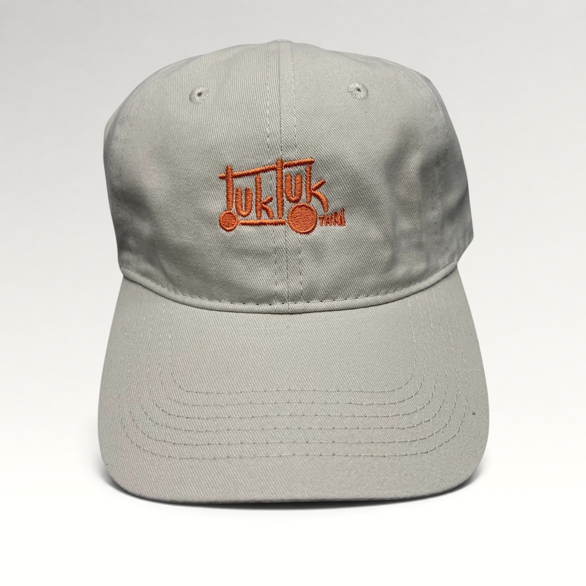 Raree Finds beige cotton strapback dad hat with orange Tuk Tuk Thai embroidered logo and curved brim