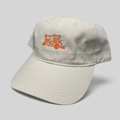 Raree Finds beige cotton strapback dad hat with orange Tuk Tuk Thai embroidered logo and curved brim