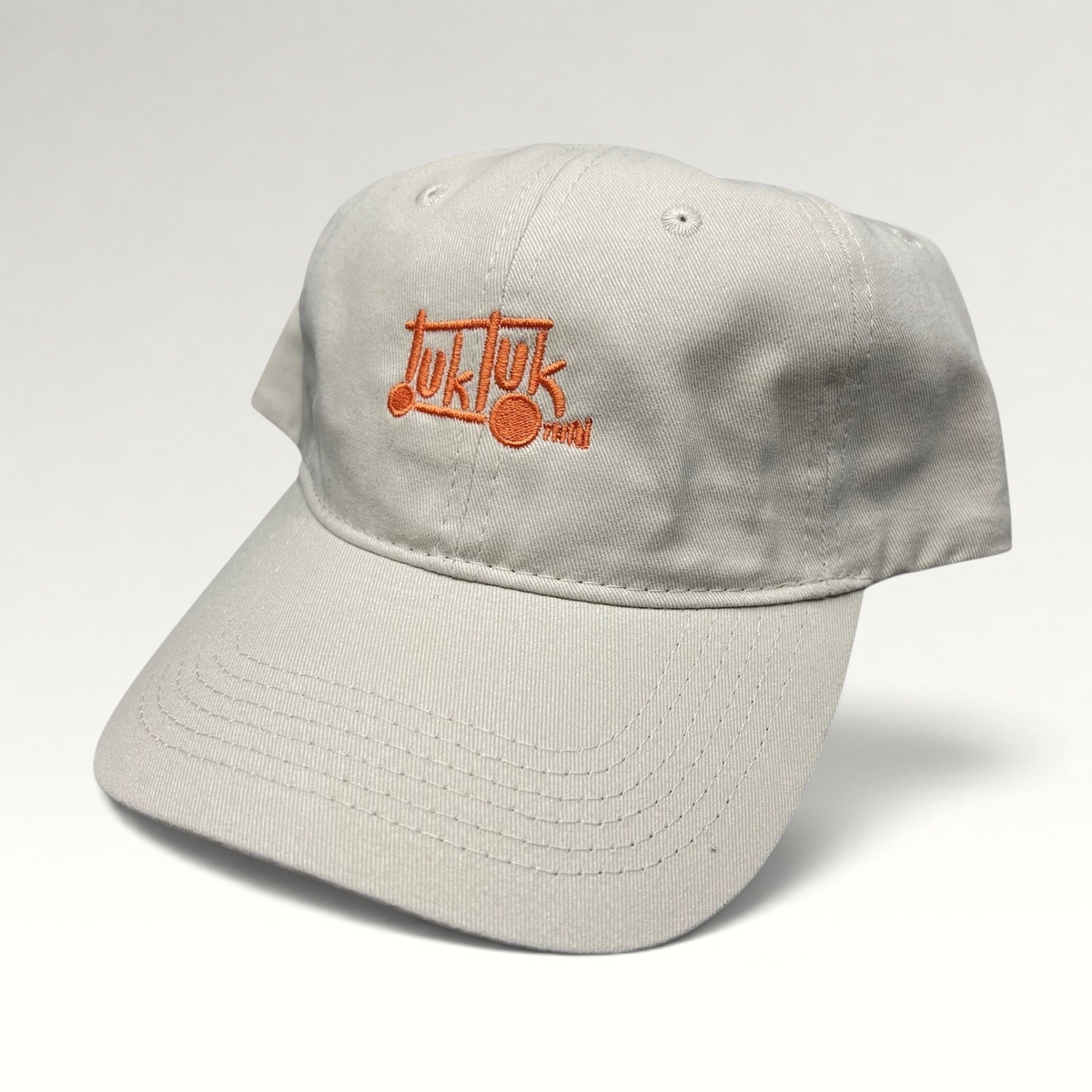 Raree Finds beige cotton strapback dad hat with orange Tuk Tuk Thai embroidered logo and curved brim